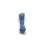 Light blue shoelace tied in a knot on a white background.