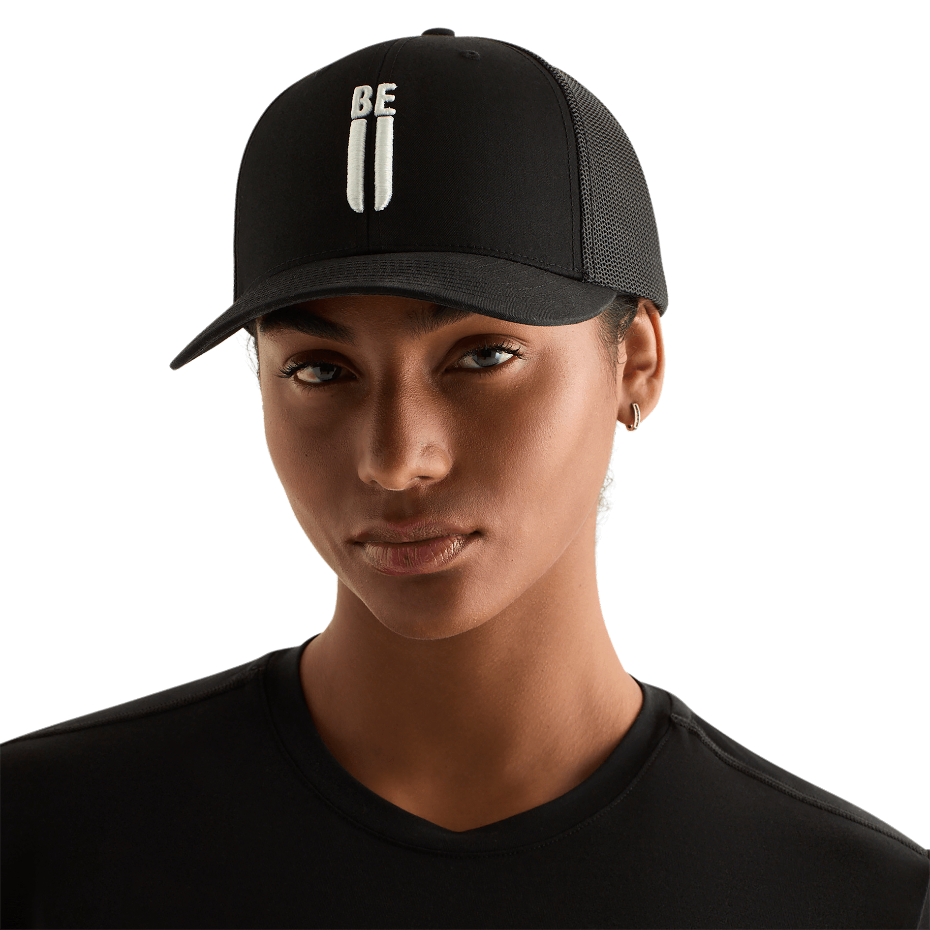 Woman Wearing Black Be U Trucker Hat Front Angle.